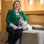 Kristine Quinby poses with her adorable dog in the Oxidized Sterling Silver Wave Necklace