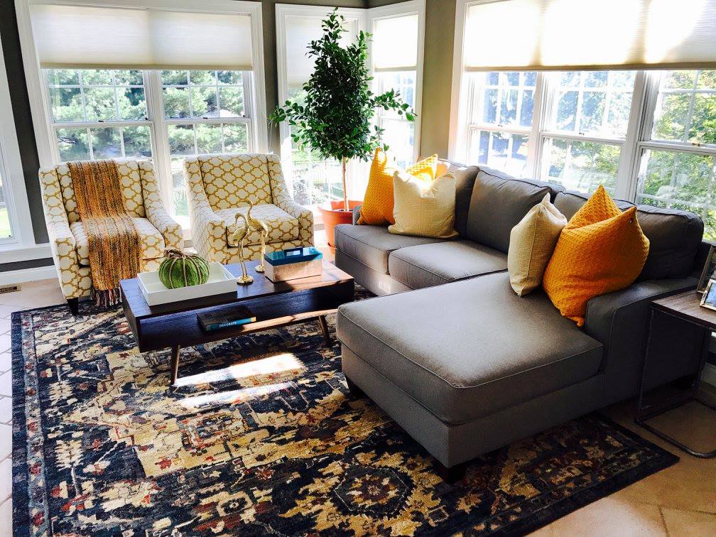 A sunroom after being designed by Jennifer Smith.