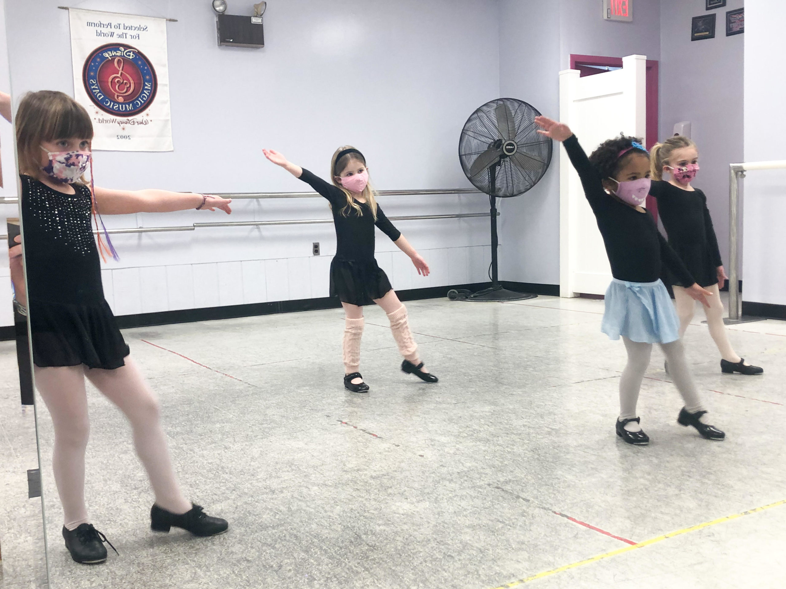 TDA dancer with masks