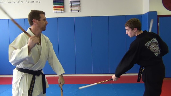 Sensei Rosanelli practices Escrima stick form with student, Josh DeFrancisco