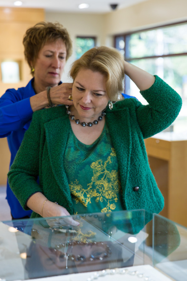 Kristine Quinby tries on Diana Vincent's Oxidized Sterling Silver Wave Necklace