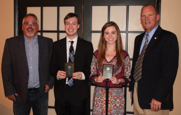 Perkasie Rotary President Bob Hipp (left) and Committee Chair Neil Fosbenner (far right) present Student of the Month awards to Dennis Brislin, of Hilltown Township, and Kaitlyn Harries, of Bedminster Township. Both students are seniors at Pennridge High School.