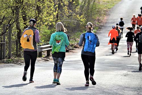 People running in 5k community event