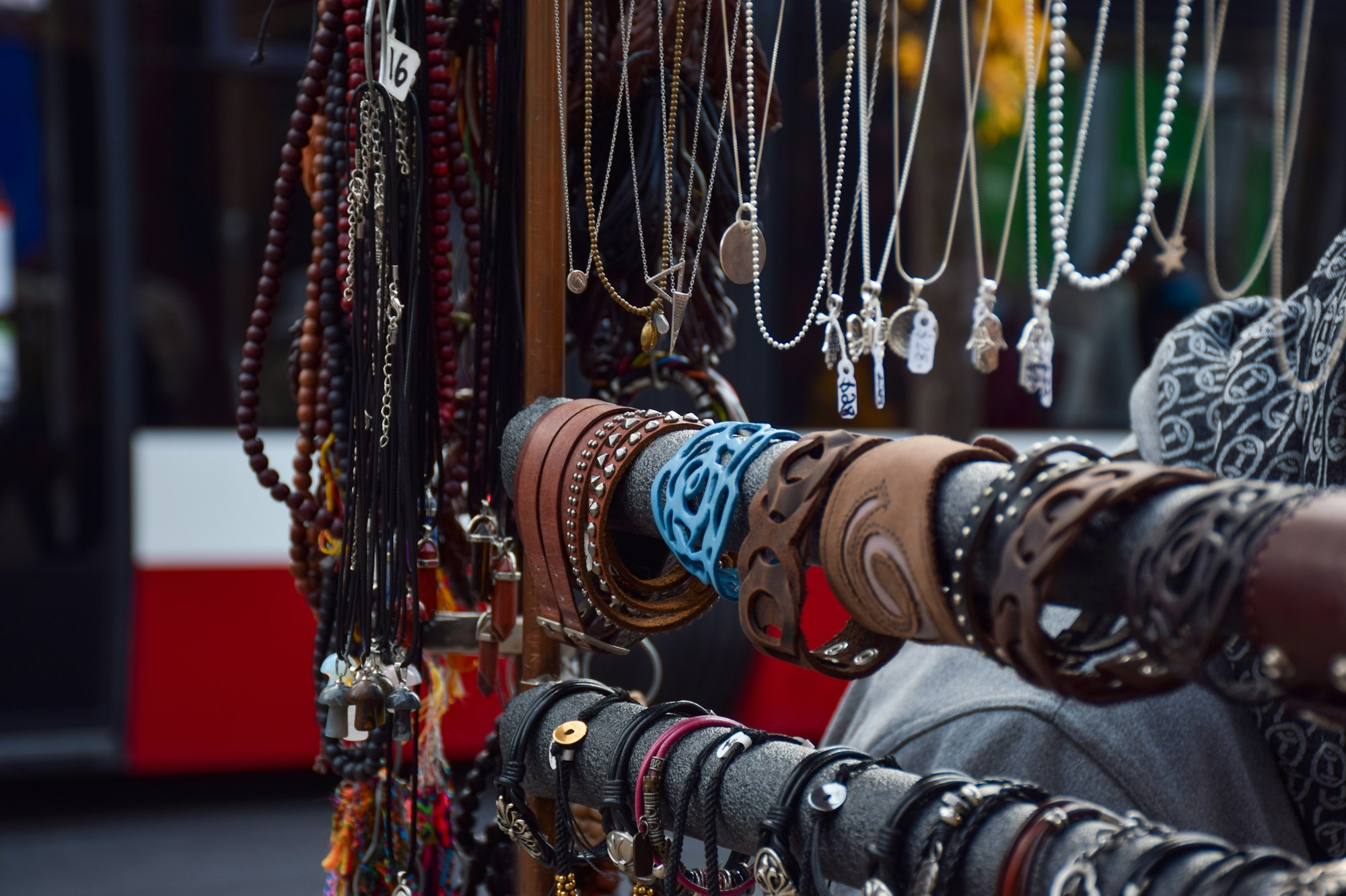 Handmade artisanal jewelry and accessories at a street market