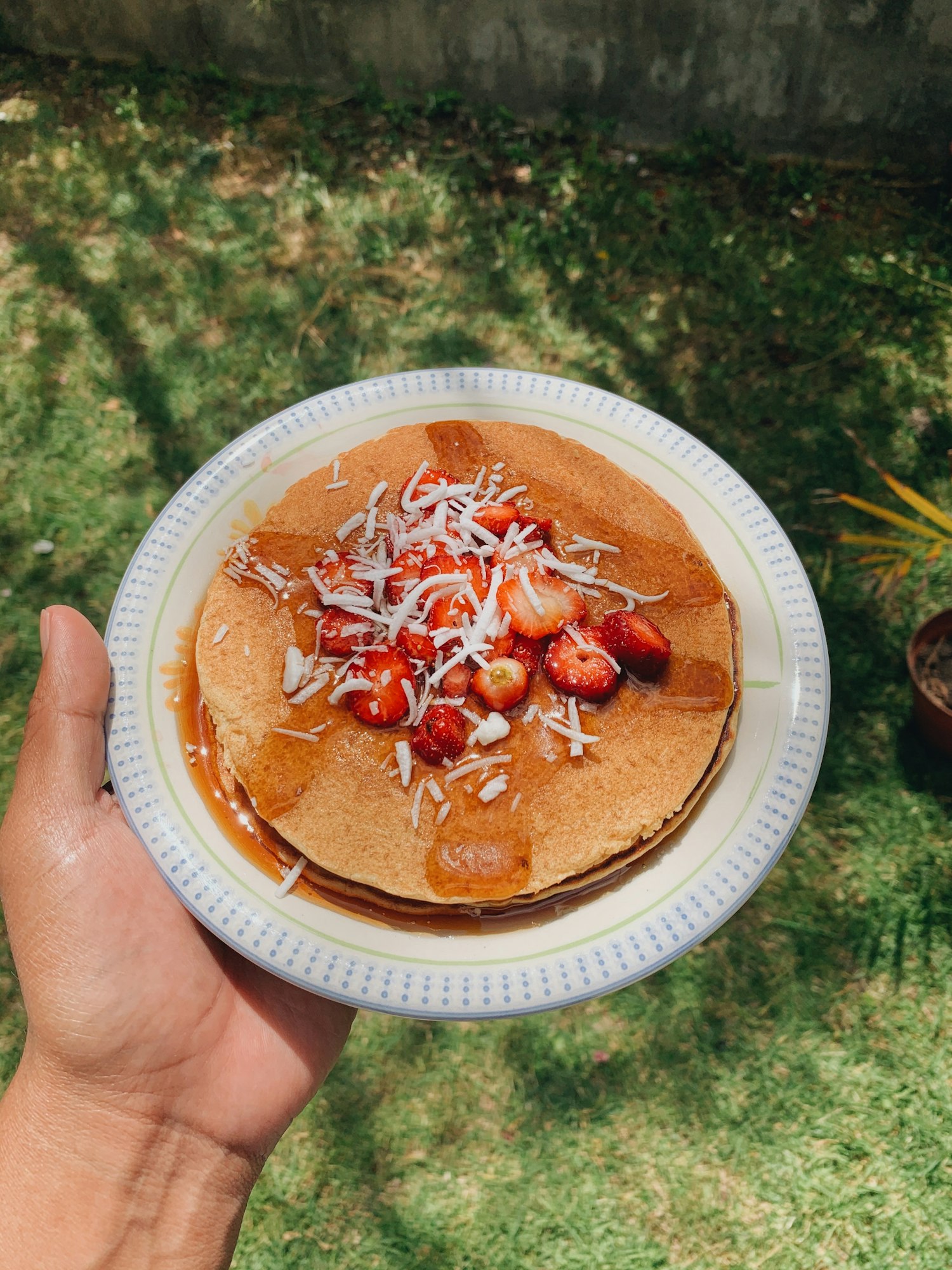 pancake with strawberries and jelly.