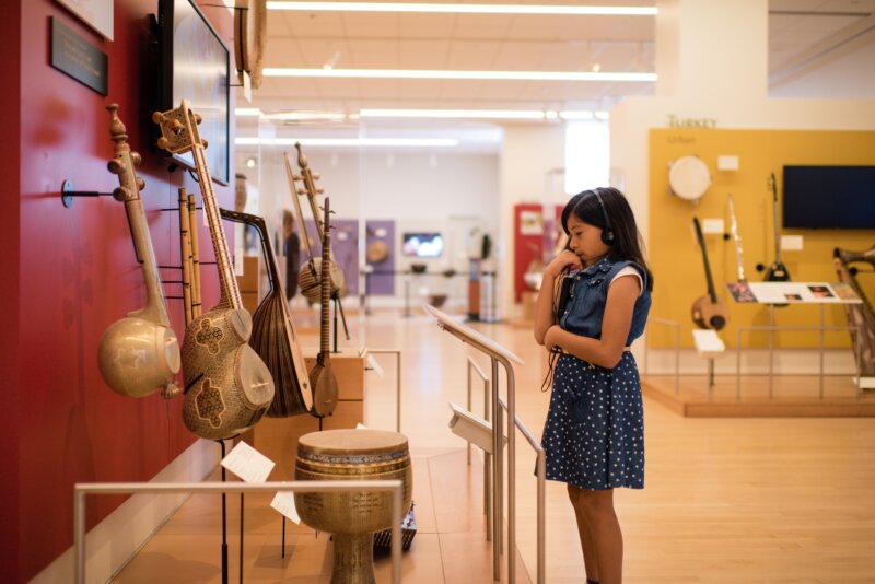 Girl at the musical instruments museum